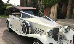 1930's style 2 door Beauford open-top convertible tourer in Ivory (roof up)