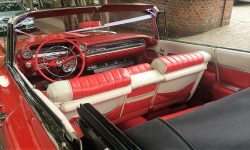 1959 Cadillac convertible in Festival Red interior