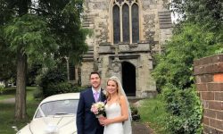 1961 Jaguar MK II in Old English White with Bride and Groom