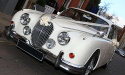1961 Jaguar MK II in Old English White with chrome wire-wheels 5