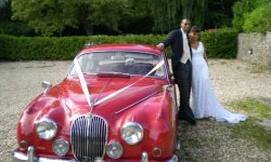 1964 Red MK II Jaguar with chrome wire-wheels