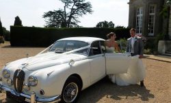 1968 MK II in Old English White with dark Blue leather interior and chrome wire-wheels 1