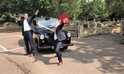 Huey Classic style Black Fairway Wedding Taxi with Silver and Chrome feature and wood panelling on the inside 2
