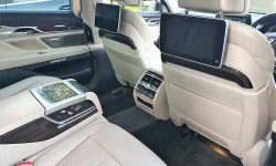 latest BMW 7 Series in Sophisto Grey with cream leather (interior 3)
