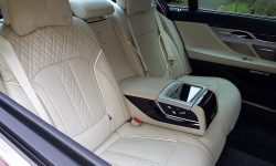 latest BMW 7 Series in Sophisto Grey with cream leather (interior shot 2)