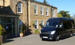 13 passenger Mercedes Party Bus in Blue (Black tint windows)