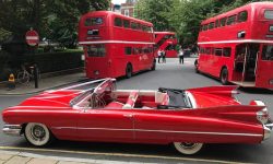 1959 Cadillac convertible in Festival Red (with Routemaster buses) 1959 Cadillac convertible in Festival Red (with Routemaster buses)
