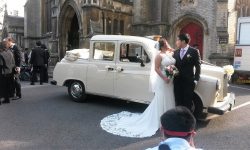Unique London Cab Laundelet in off White with bride and groom 2
