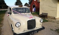 Unique London Cab Laundelet in off White with retro bride and groom