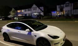 Tesla model 3 in White (night shot)