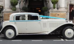 1931 Vintage Roills Royce Phantom II Continental Sports Saloon in Antique Ivory (outside The Mandarin)